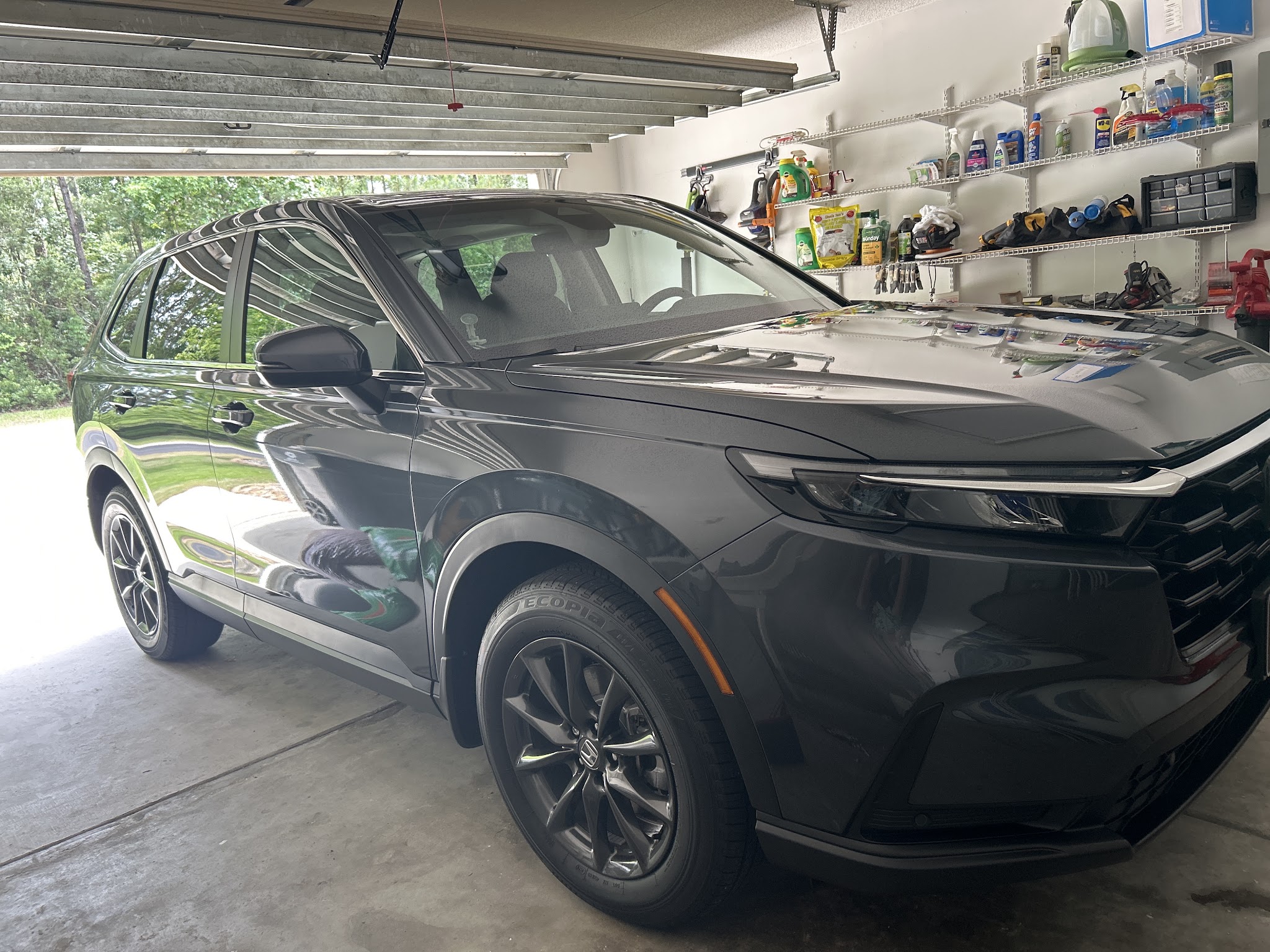 Dark SUV in a garage after a detail