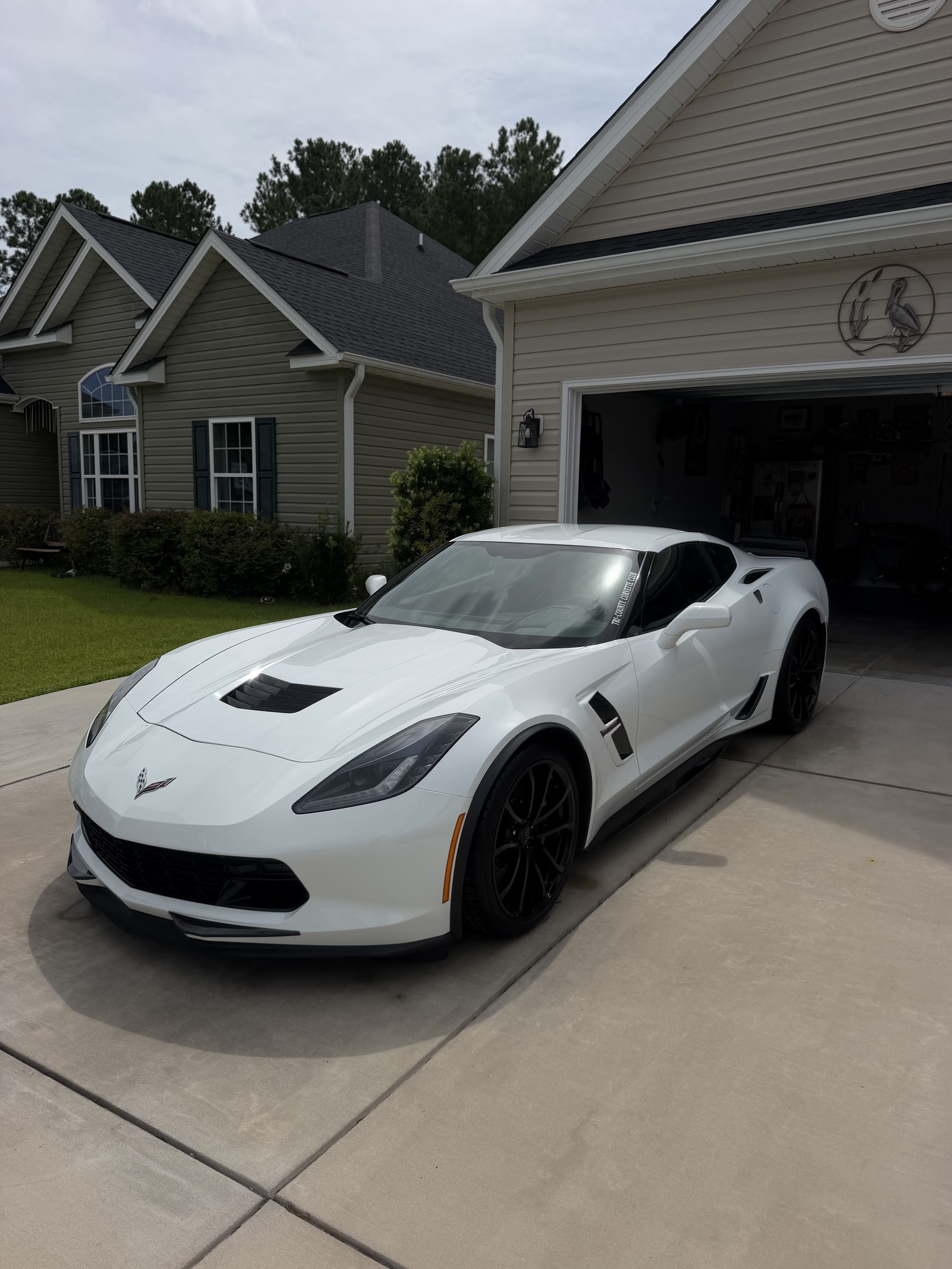White Corvette with a deep, glossy finish